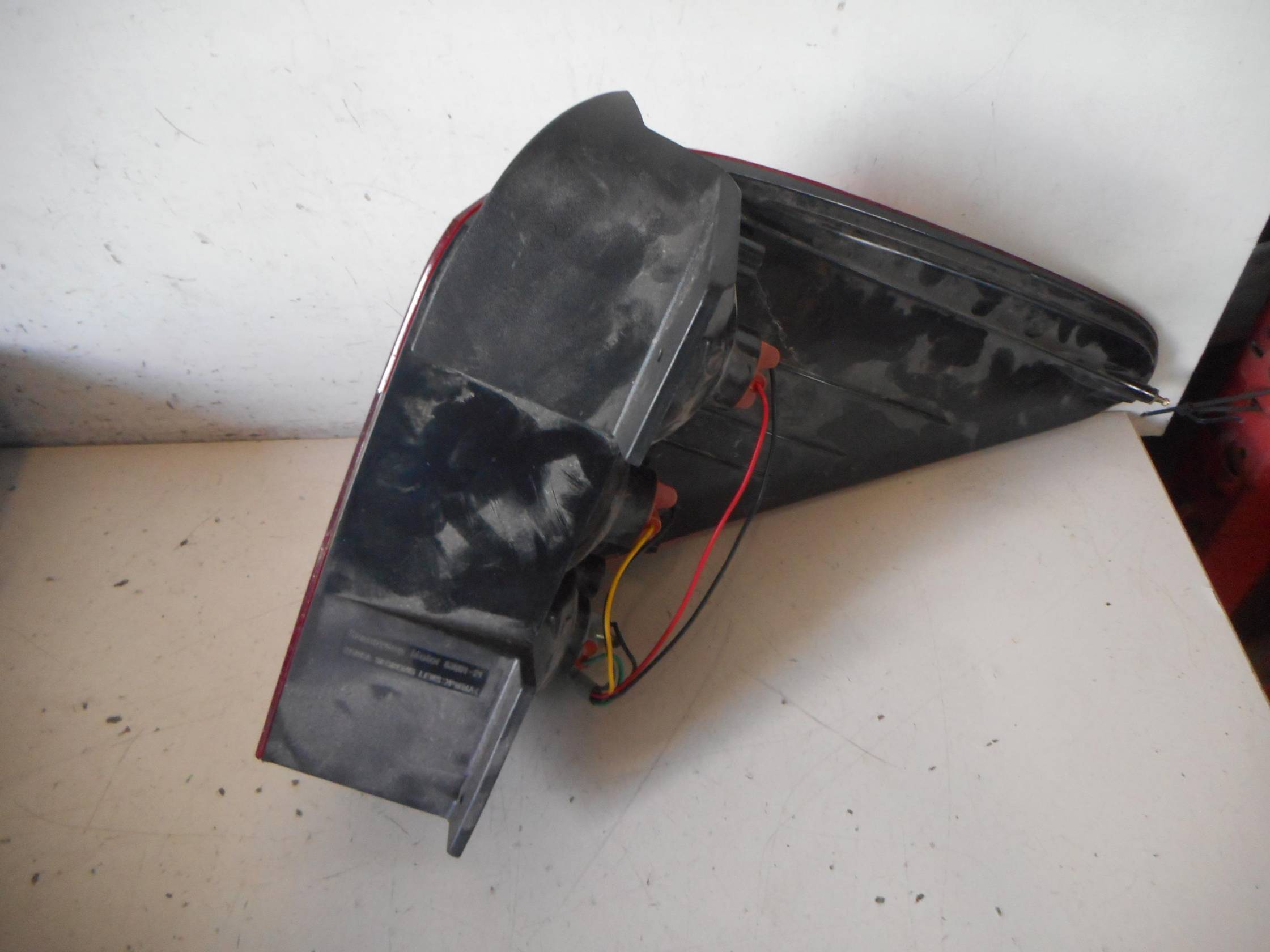 Fanale post. parte est. sx.